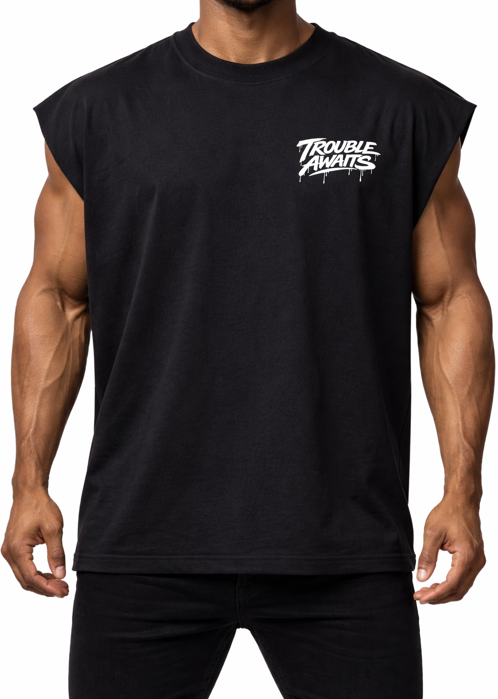 A studio-style image shows a muscular, athletic man standing against a clean, light gray background. The image is cropped from just below the nose to the upper thighs, focusing on the torso and arms. The model has a well-defined physique with prominent shoulders, biceps, and forearms, and a clearly visible, toned midsection.

He is wearing a black, sleeveless, boxy cropped top. The shirt has a wide, oversized fit through the shoulders and chest, with dropped arm openings that expose more of the upper arms. 